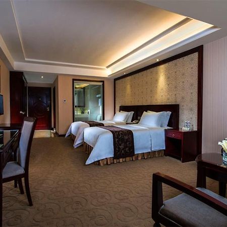 Vienna Hotel Shenzhen Fenghuang Road Bagian luar foto